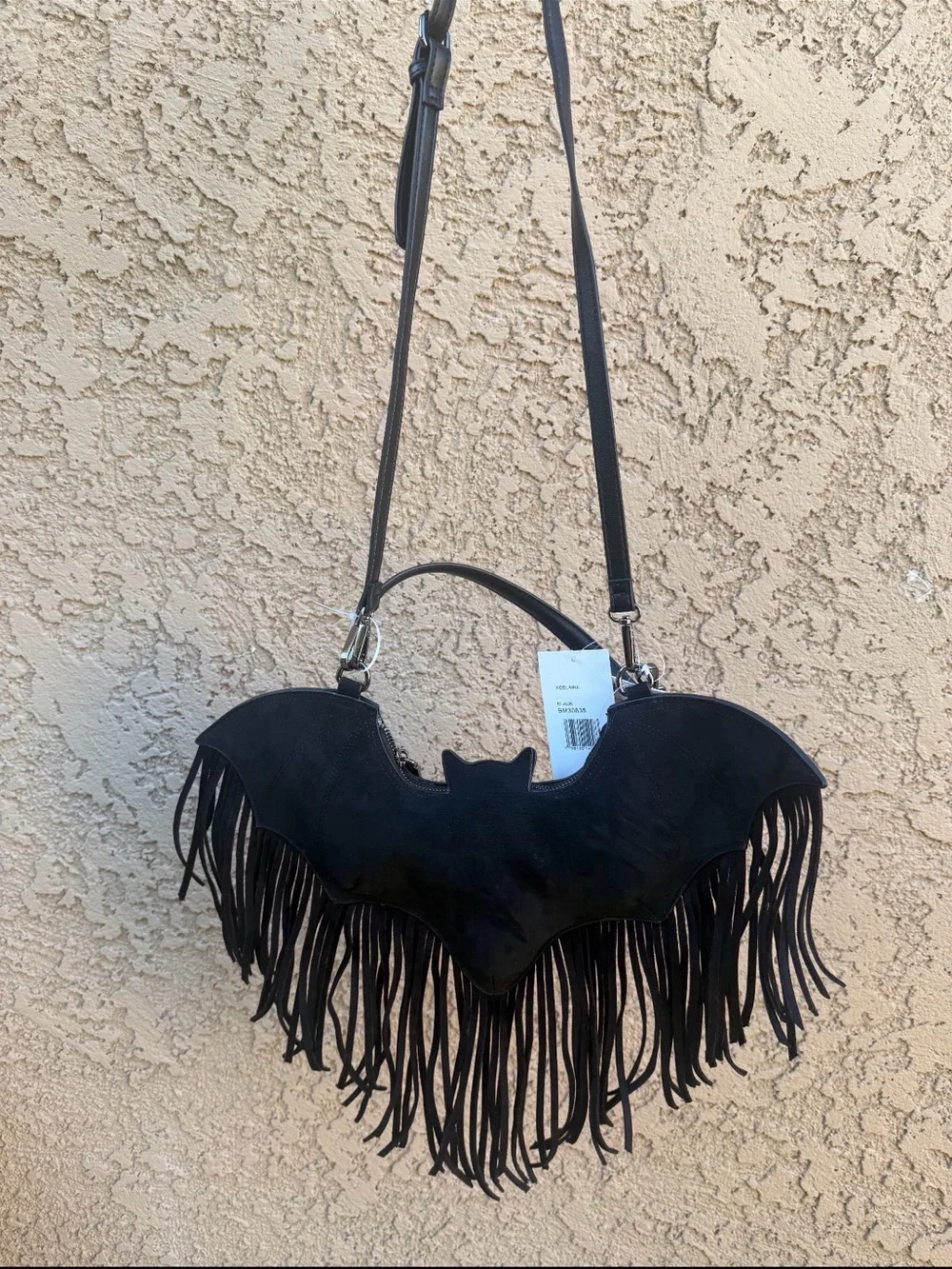 Betsey Johnson statement bat